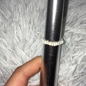 Seed bead ring made by my daughter.